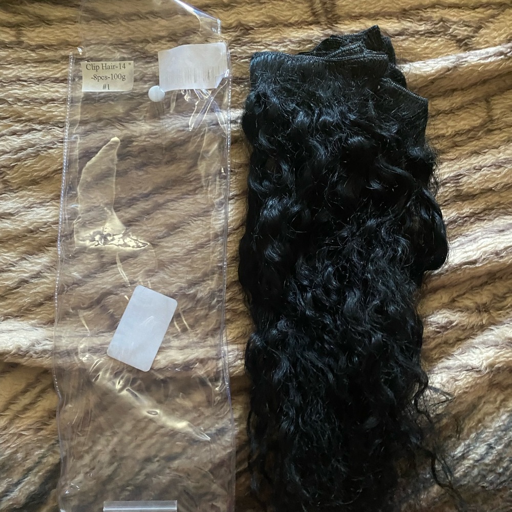 Human Remy Hair Curly 14 inches 8 pieces.
